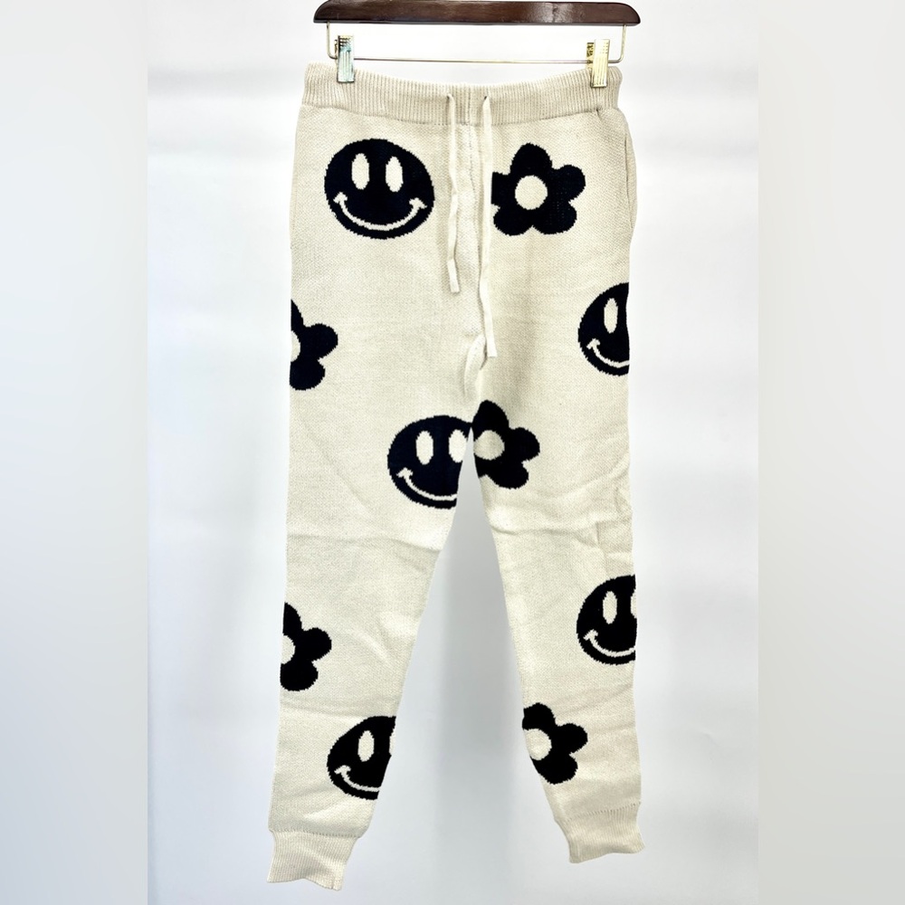 Women’s Dressed in LALA Off White and Black Smiley Face Cropped Jogger Pants - Picture 3 of 8